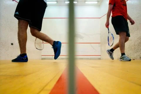 Two friends playing squash in Mutilva, Navarra, Spain Stock Photos