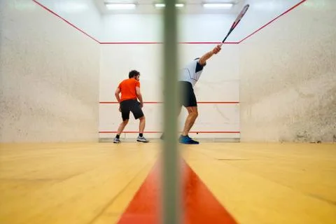 Two friends playing squash in Mutilva, Navarra, Spain Foto stock