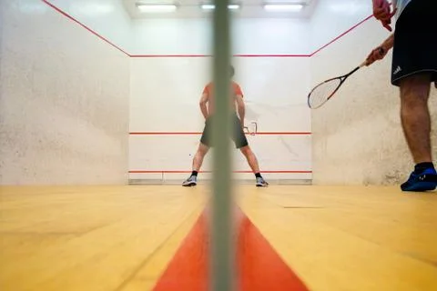 Two friends playing squash in Mutilva, Navarra, Spain Stock Photos