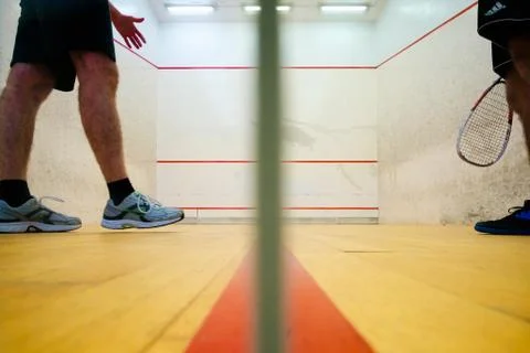 Two friends playing squash in Mutilva, Navarra, Spain Stock Photos