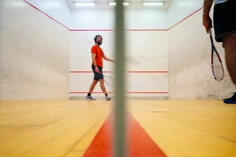 Two friends playing squash in Mutilva, Navarra, Spain Stock Photos