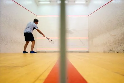Two friends playing squash in Mutilva, Navarra, Spain Stock Photos
