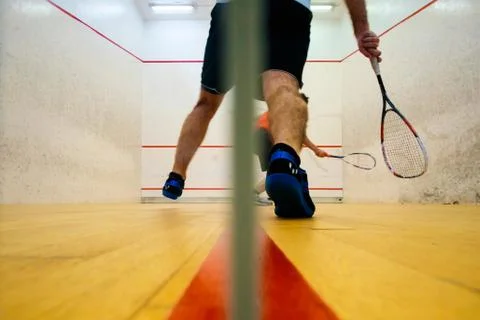 Two friends playing squash in Mutilva, Navarra, Spain Stock Photos