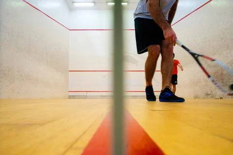 Two friends playing squash in Mutilva, Navarra, Spain Stock Photos
