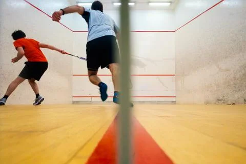 Two friends playing squash in Mutilva, Navarra, Spain Stock Photos