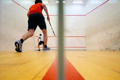 Two friends playing squash in Mutilva, Navarra, Spain Stock Photos