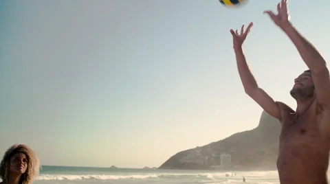 Two friends playing volleyball on Ipanema beach Stock-Footage 59377373