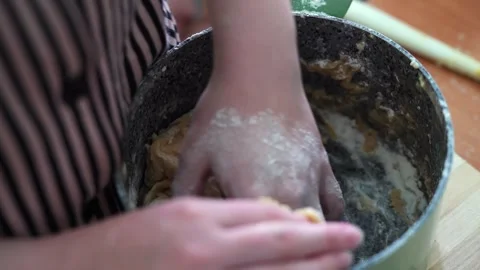Two friends preparing honey dough for sand cookies Stock Footage 317798036