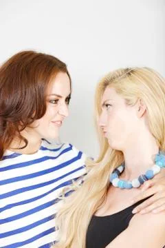 Two friends pulling faces 写真素材