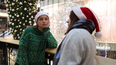 Two friends standing bored before new year Stock Footage 325212635