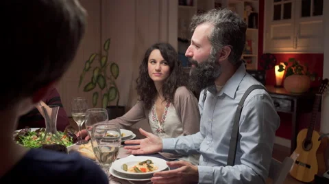 Two friends talking in a dinner Stock Footage 46515139