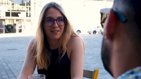 Two friends talking laughing and relaxing in a coffee shop. Barcelona Stock Footage 157004986