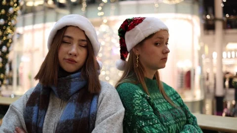 Two friends upset after argument in christmas mood Stock Footage 325212558