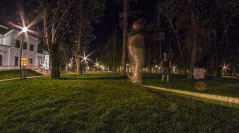 Two friends walk slackline in the park 4K UHD psychedelic processing Stock Footage 37169448