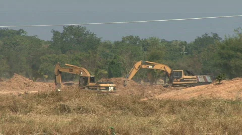 Two Front Diggers Working In Rural Thailand 스톡 동영상 737463