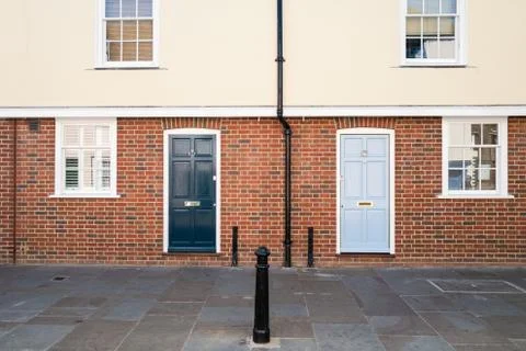 Two front doors, one dark blue, one light blue, Stock Photos