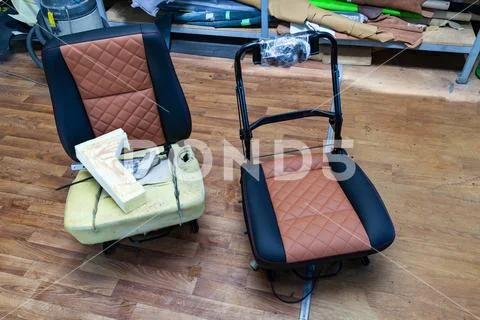 Two front seats with combined leather trim in double colors of black and brow Stock Photos