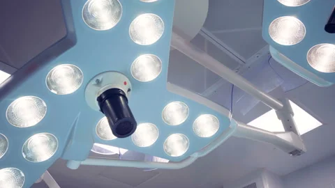 Two functioning surgical lamps of irregular shape 動画素材 93419837
