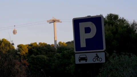 Two funiculars are moving towards each other against the blue sky. Trees and Stock Footage 101200789