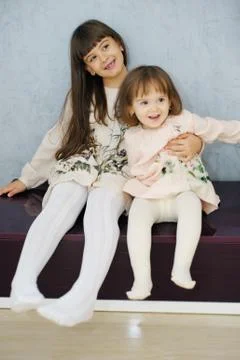 Two funny sisters in the studio Foto stock