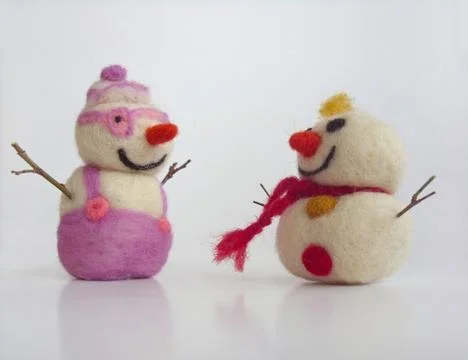 Two funny snowmen Stock Photos