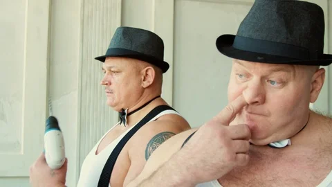 Two funny strongmen being silly Stock Footage 87840236