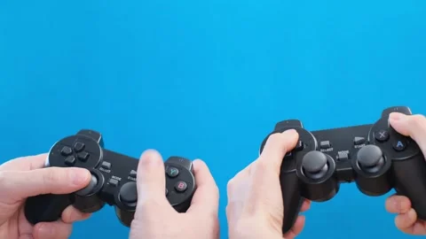 Two game controller isolated on blue background Stock Footage 255288823