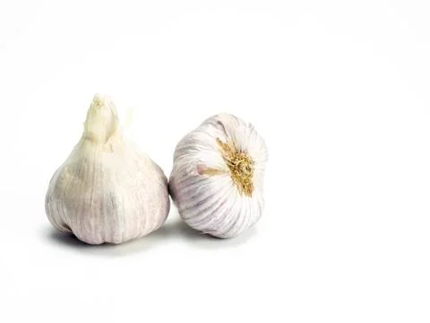 Two garlic cloves Stock Photos