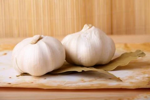 Two garlic heads Stock Photos