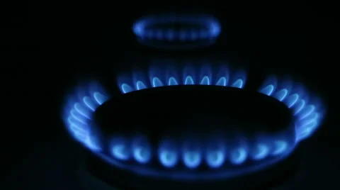 Two gas fire from kitchen in dark Stock Footage 69000797