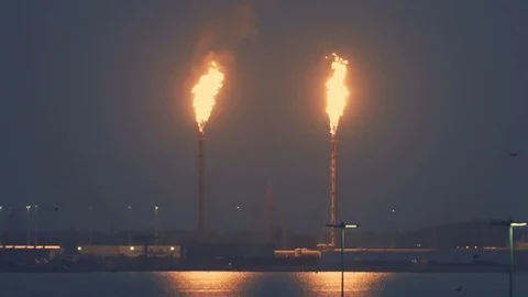 Two gas flares burning at night, close up 2 Stock Footage 117834601