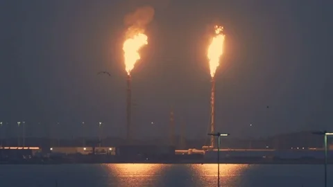 Two gas flares burning at night, close up 3 Stock Footage 117834651