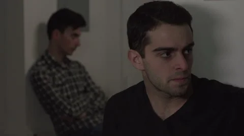 Two gay men after an argument, one angry, one upset. Stock-Footage 44111544