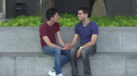 Two gay men on a bench, first together, then apart. Stock Footage 44110784