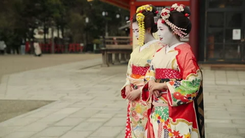 Two Geisha Maiko Walking Together Wearing Kimono Japan HD Stock Footage