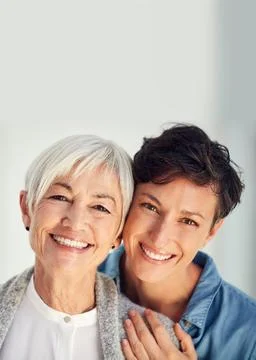 Two generations the same magnificent smile. Cropped portrait of an affectionate Stock Photos