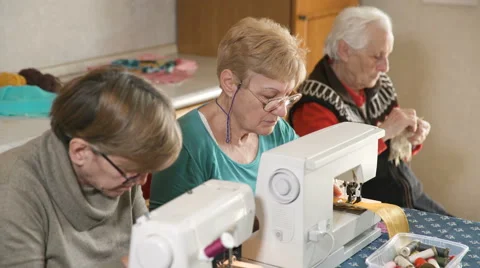 Two generations of seamstress at work, home, women Stock Footage 59642206