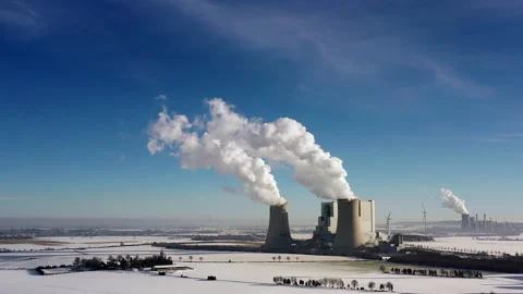 Two German Coal-fired Power Plants in a Rural Environment in Winter. Stock Footage 263154089