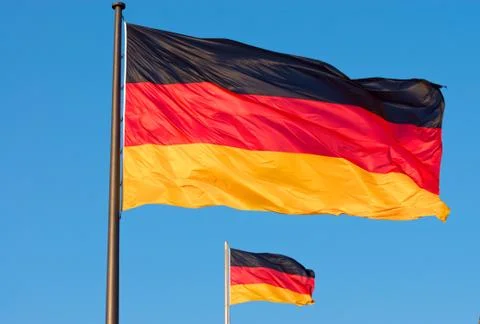 Two german flags flying Stock Photos