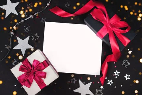 Two gift boxes on black background. Stock Photos