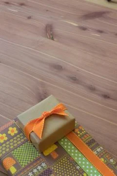 Two gift boxes stacked, retro wrapping paper with flowers and mushrooms Stock Photos