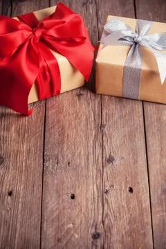 Two gift boxes on wooden background Stock Photos