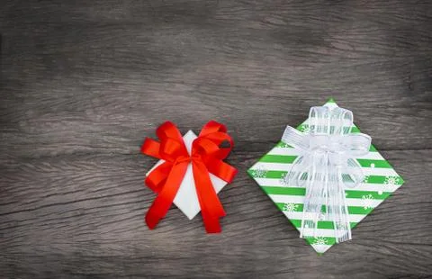 Two gift boxes on a wooden background Stock Photos