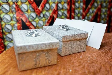 Two gift packaging on the table Stock Photos