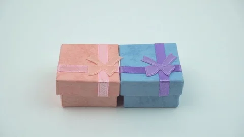 Two giftboxes on white Stock Footage 104702756