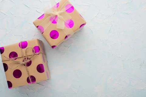 Two gifts on a light background with an empty space for writing or advertisin Stock Photos