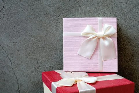 Two gifts on a stone Stock Photos