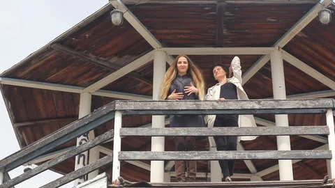 Two girlfriends have fun on pier. Stock Footage 89152764