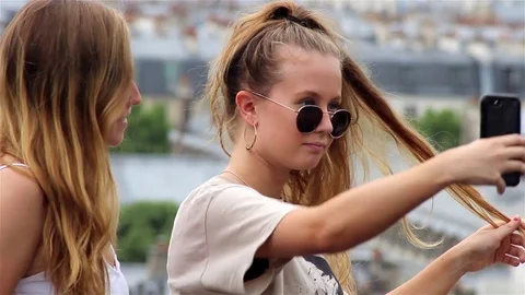 Two girlfriends posing Stock Footage 78504561