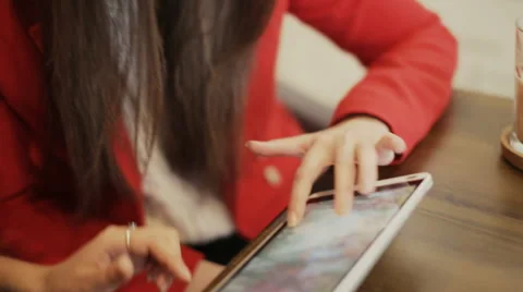 Two girlfriends with tablet smile in cafe Stock Footage 57239224